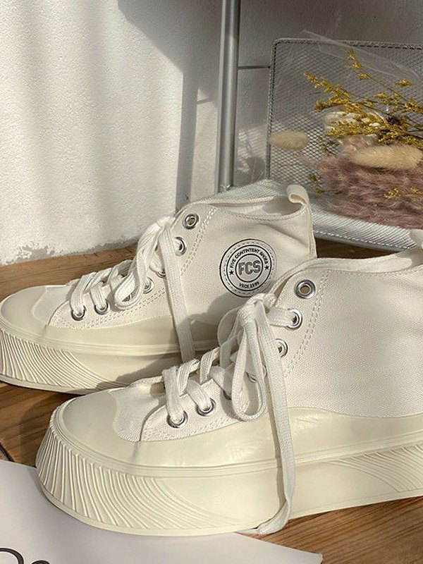 Sneaker alta con suela en contraste-1